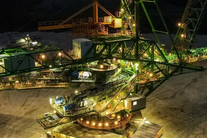 Has top ASX mining stock, Santos reached at fair valuations?